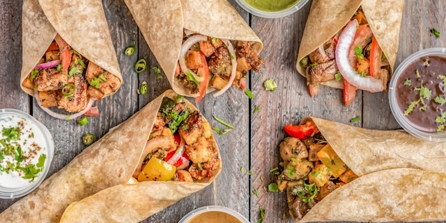 Tortilla wraps on a wooden board.